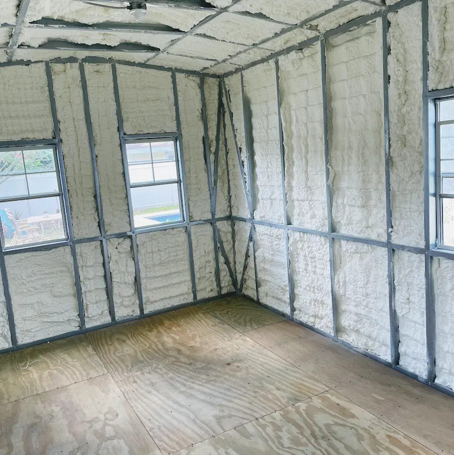 Closed-cell spray foam insulation applied to wall cavities in a residential project in Holly Springs
